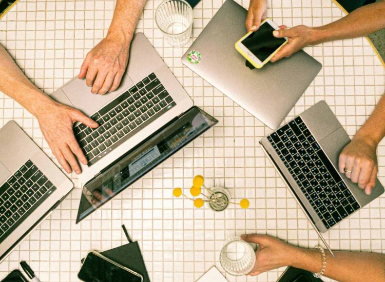 People collaborating at a table.